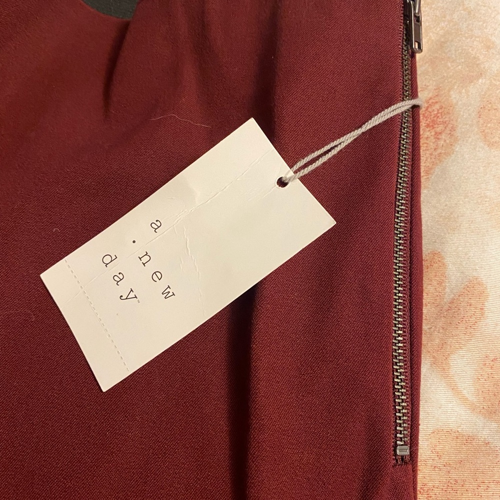 Maroon straight leg office pants.